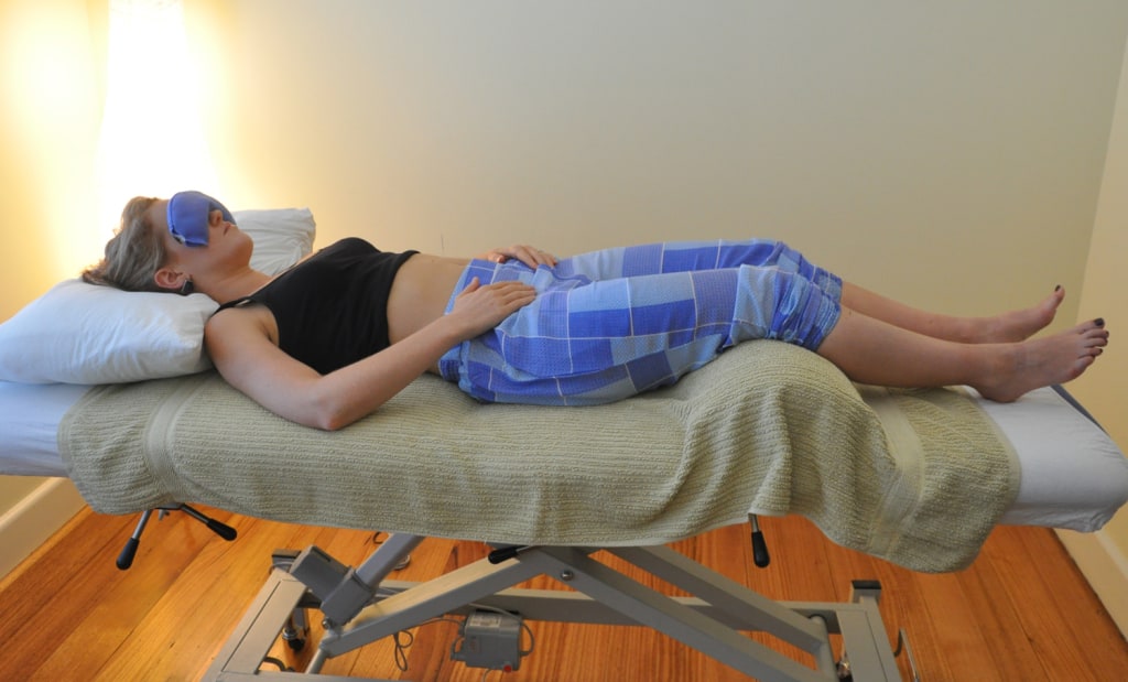Having Two Periods in One Month? It May Be Ovulation Bleeding 2 a patient having acupuncture in a peaceful room in Coburg acupuncture Melbourne