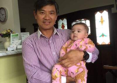 Acupuncturist Richard Zeng with baby