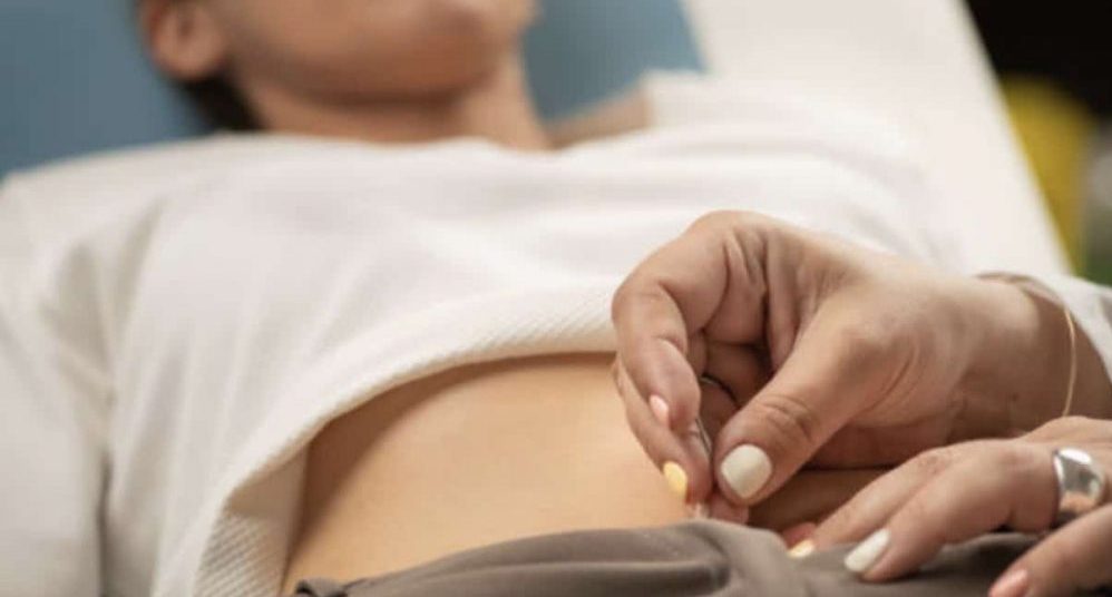 IVF Acupuncture Melbourne 1 Experienced acupuncturist at Almond Wellness Centre performing acupuncture to support a patient's IVF journey